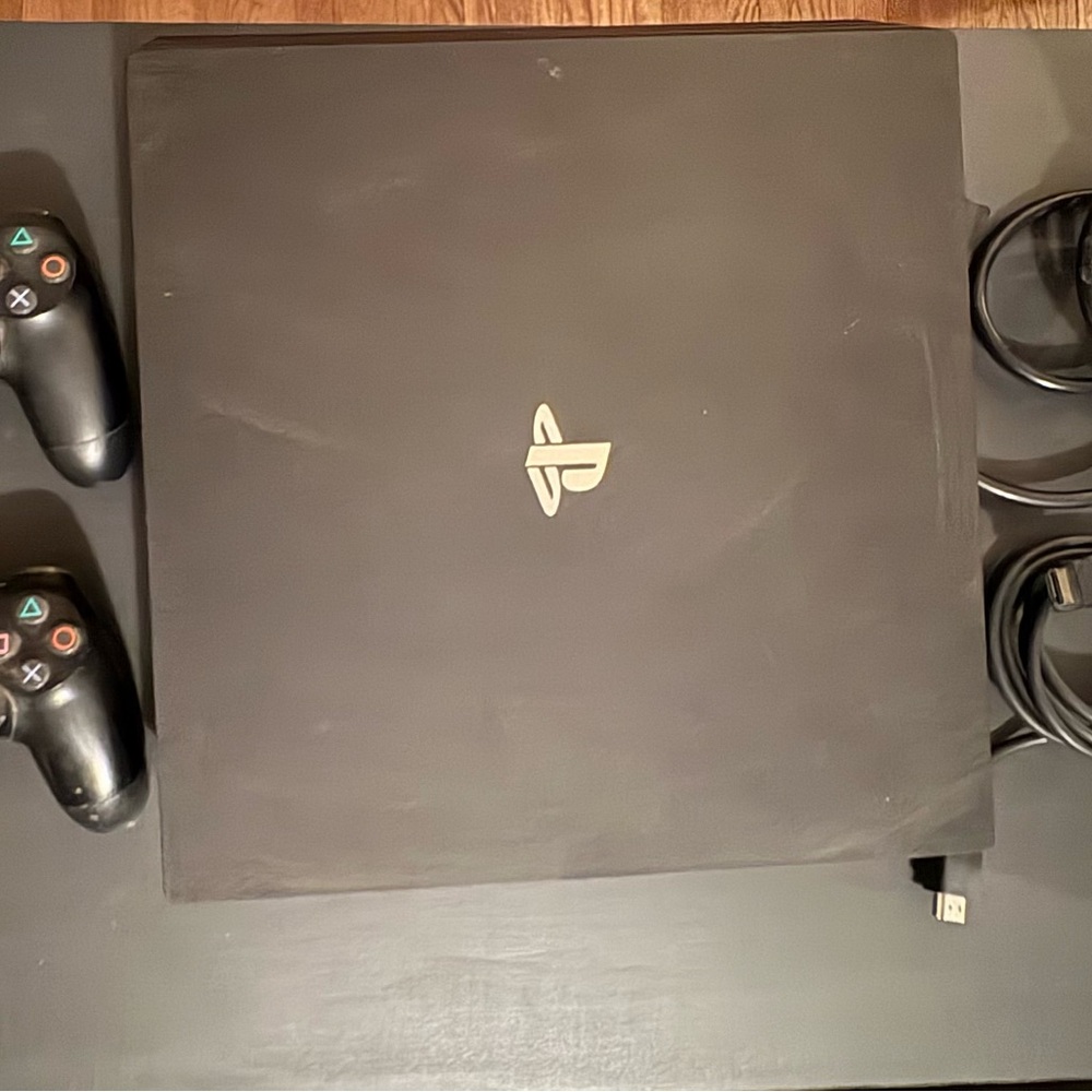 Sony PlayStation 4 Console with 2 Controllers, Power Cord and HDMI Cable